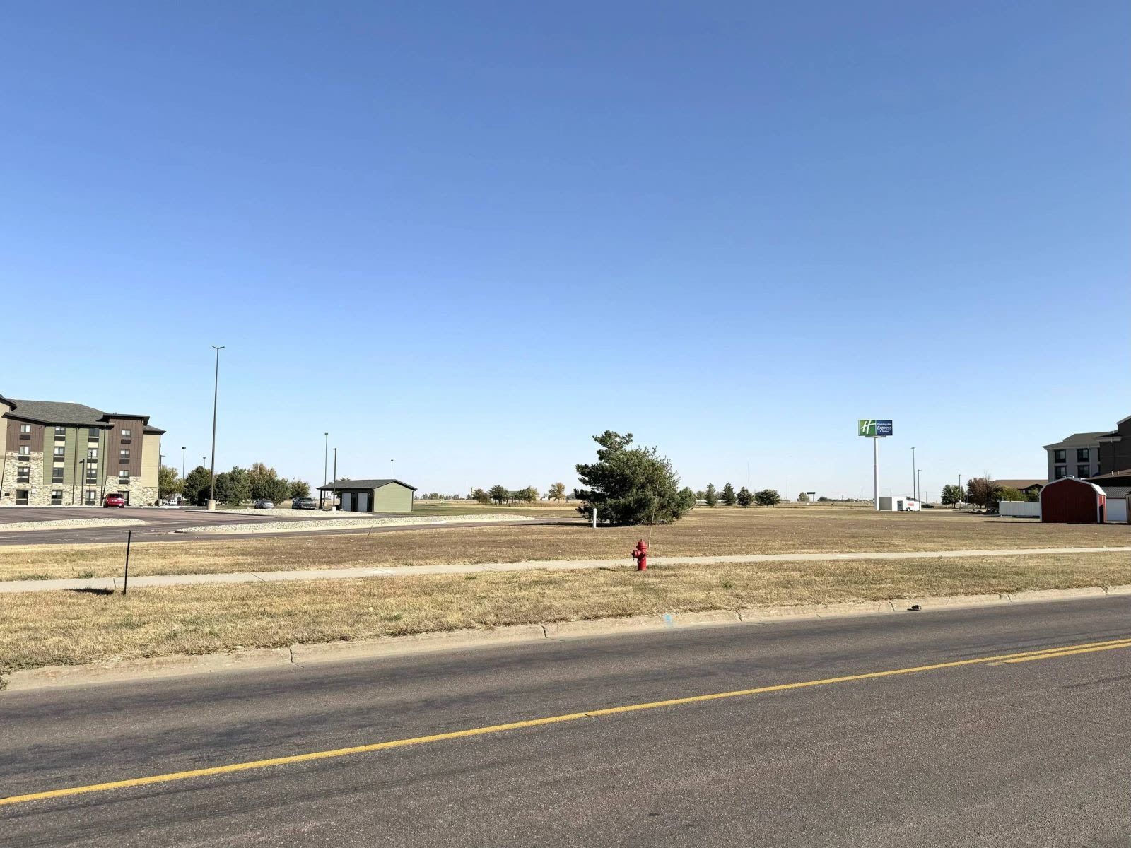 Interior and site view of E Spruce St, Mitchell, SD — Restaurant Site in Mitchell, South Dakota